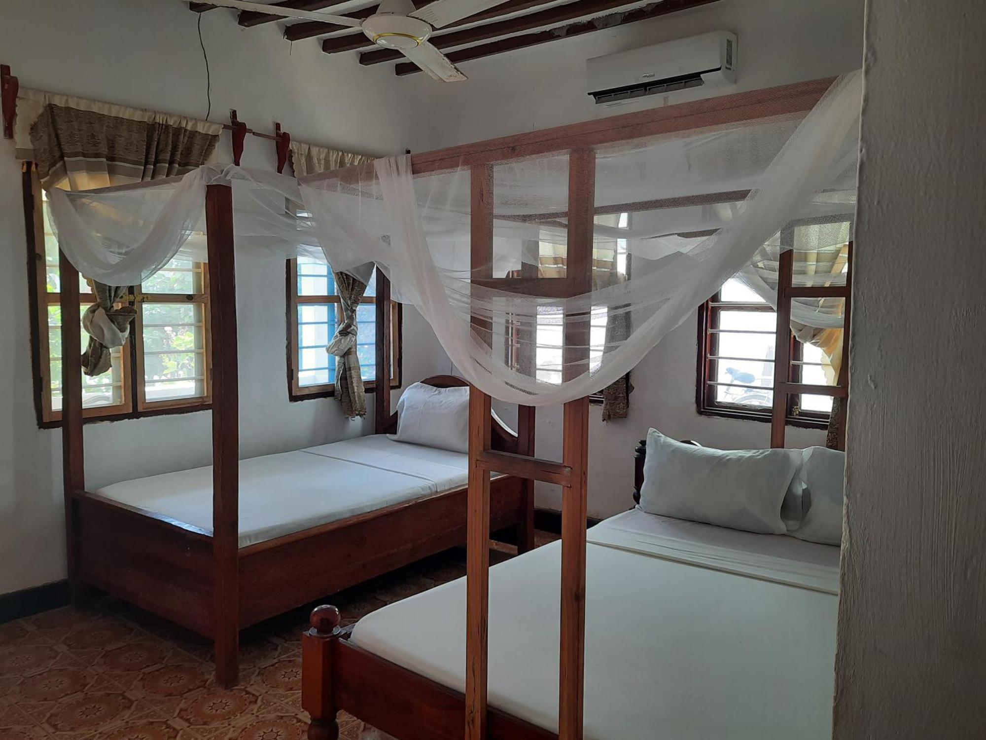 Ames Nungwi Bed and Breakfast Rum bild