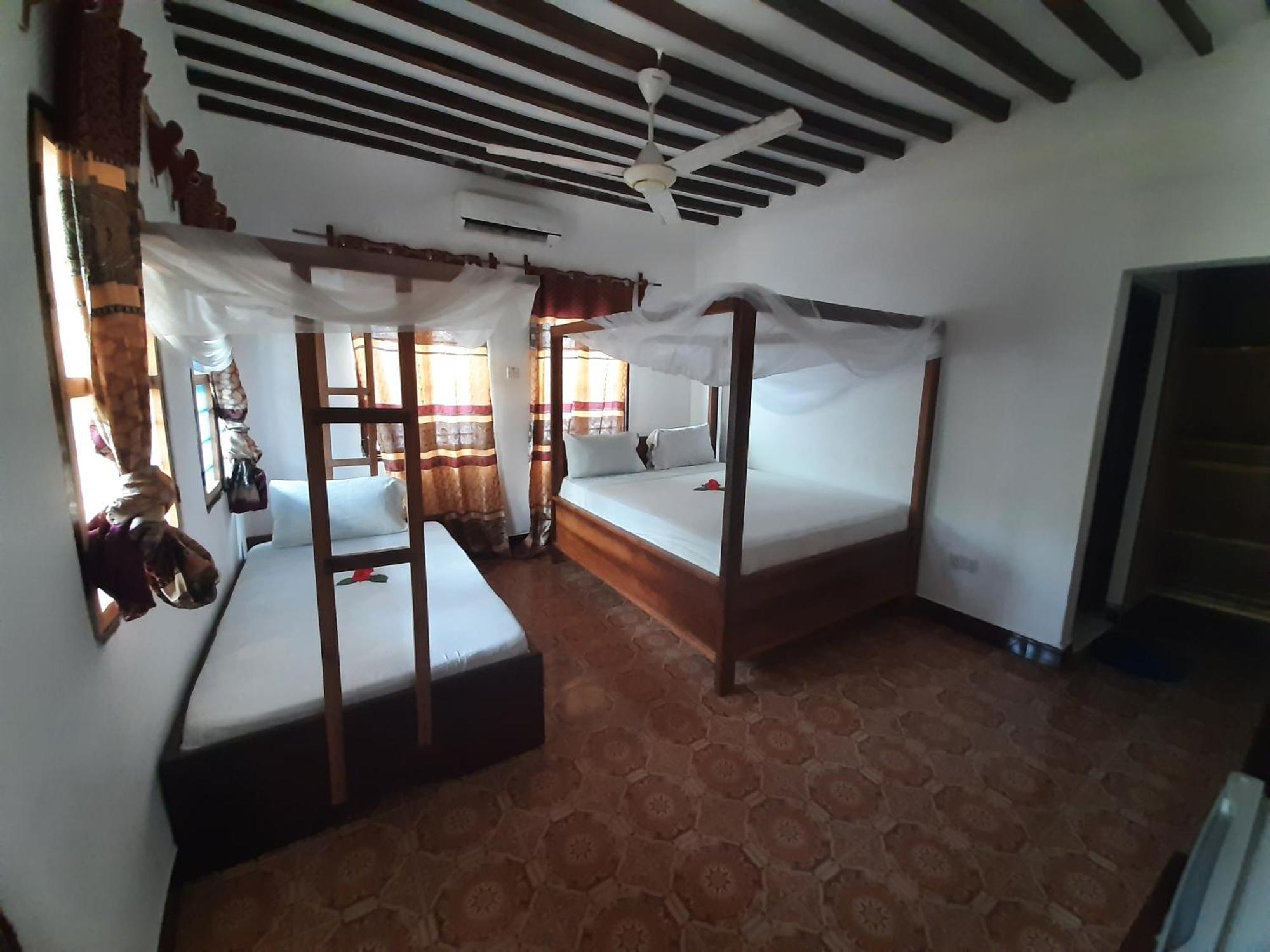 Ames Nungwi Bed and Breakfast Rum bild